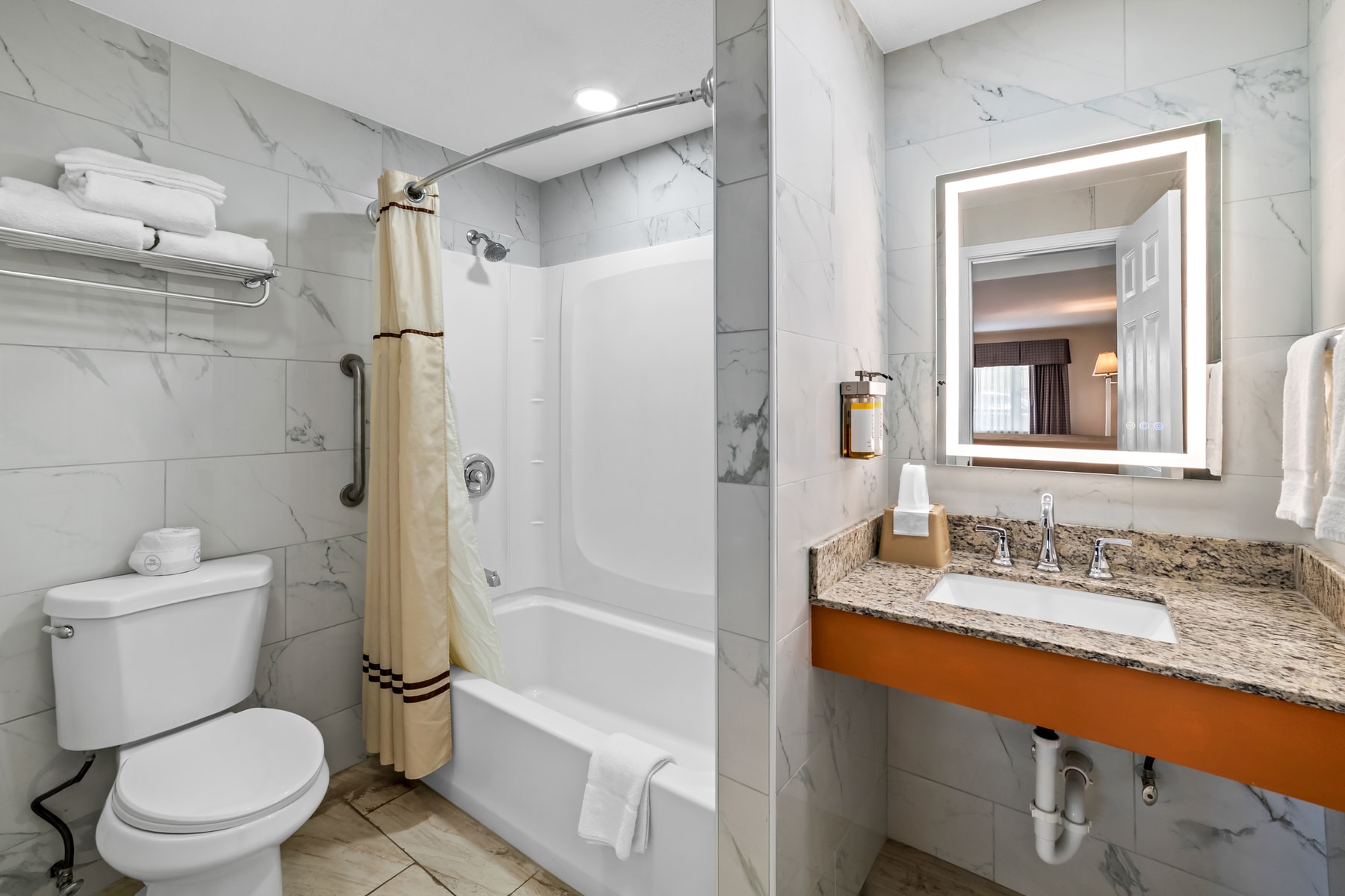 Spring Water Inn guest bathroom with bathtub and shower